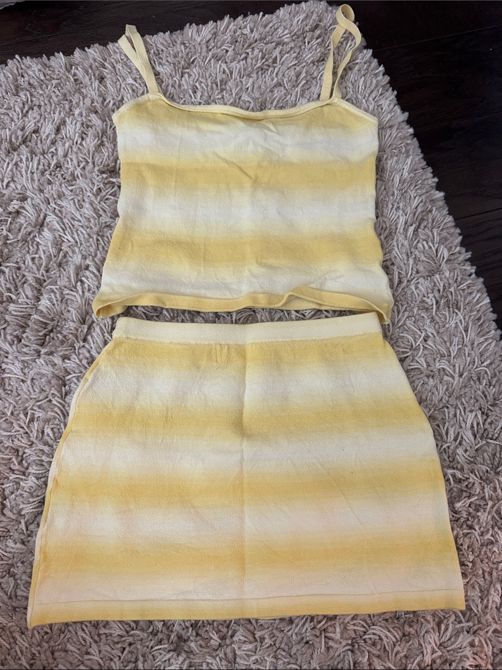 I am Delilah. Yellow two piece set size small. Worn once